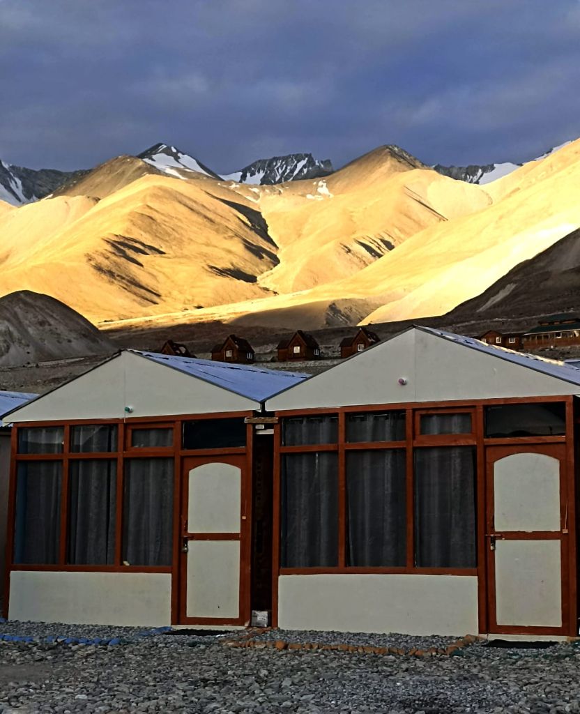 Cottage at dusk with golden light