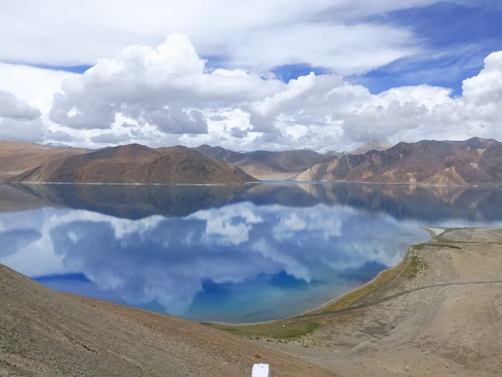 Pangong Lake from above with cloud reflections