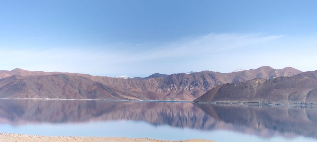 Calm lake morning reflection