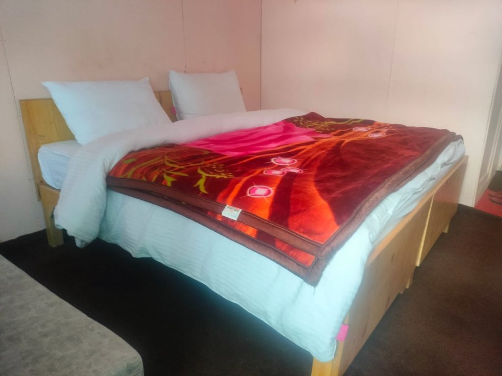 Cozy room with red blanket